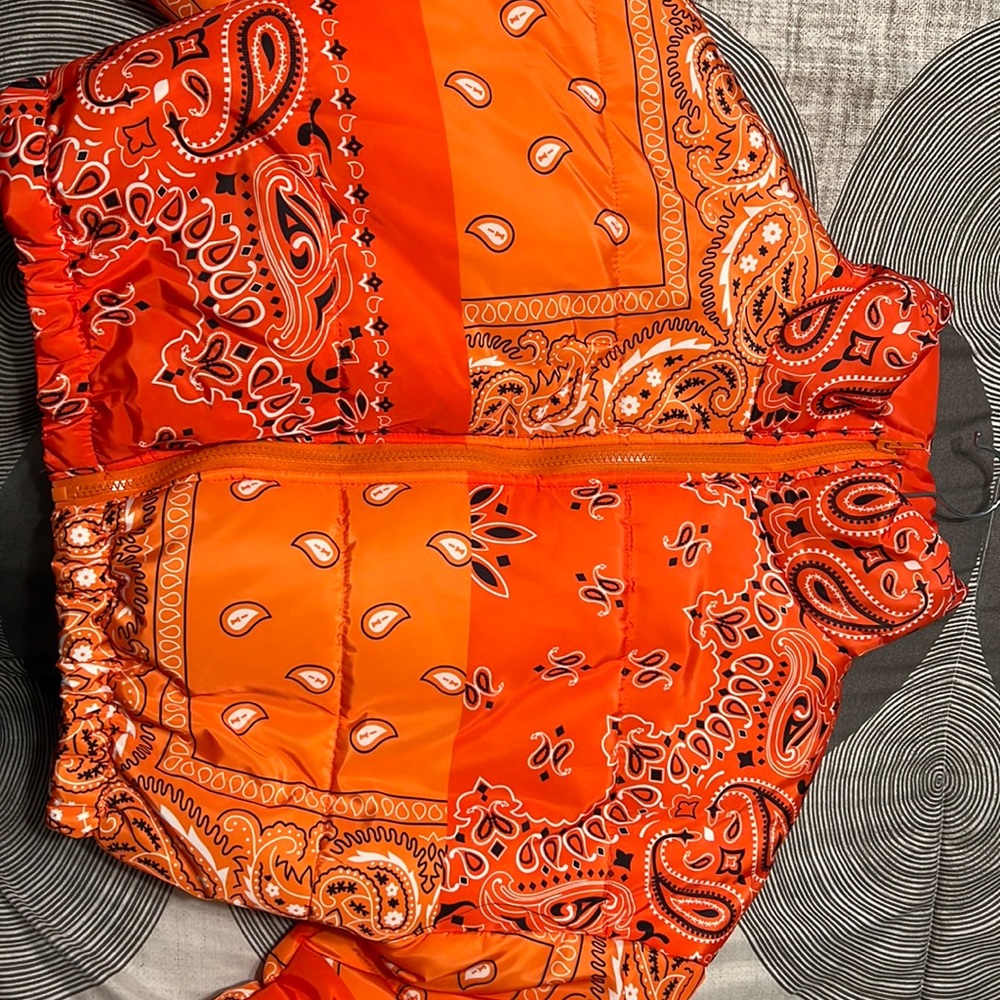 Orange cropped banana puffer coat